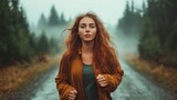 A woman with red hair jogs on a misty forest road, surrounded by lush greenery. The autumn atmosphere creates a tranquil and serene mood in the scene.