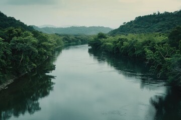 Poster - A serene lake scene surrounded by lush greenery and rolling hills, perfect for outdoor and nature-related concepts