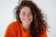 © Vii - A smiling woman with long brown hair looking directly into the camera