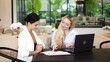 © wedmoments.stock - A real estate manager in the office shows the layout of the apartment and advises the client on purchase, rental and mortgage issues. Concept of buying or renting real estate.