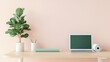 © MAY - A standing desk in a home office setting, featuring a laptop, a plant, and a yoga mat rolled up in the corner, suggesting a balanced and holistic approach to work life integration.