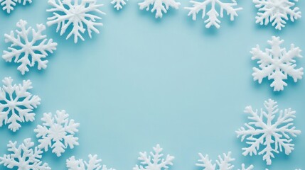 Poster - Beautiful White Snowflakes Arranged in a Circular Pattern on a Soft Blue Background Ideal for Winter Themed Designs or Holiday Celebrations and Promotions