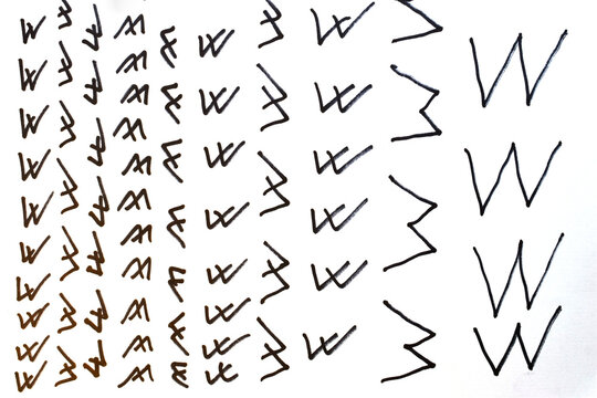 The scribbles resembling the letter W are drawn with a black marker.