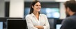 © Adobe Contributor - Smiling Woman in White Shirt at Work