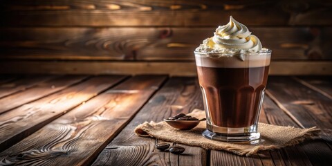 Poster - A glass of coffee topped with whipped cream and resting on a wooden table with coffee beans and a spoon