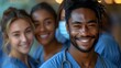 © Yuliia - A diverse group of healthcare professionals in scrubs smiling together outdoors. Ideal for healthcare, teamwork, and medical profession themes.