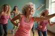 ©  S u n n y B u n n y - Energetic seniors embracing zumba dance fitness with joyful enthusiasm in a group class setting.