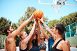© peopleimages.com - Happy people, team sport and game with basketball in unity for match, fitness or exercise at outdoor court. Young, group or players with ball for motivation, support or trust in solidarity in nature
