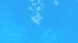 © Nora - Bubbles and seething water in the light of sunlight.Blue water texture.