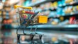 © Juan - Mini shopping cart filled with groceries in supermarket