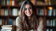 © Tania - Gorgeous Young Woman Smiling with Stack of Books