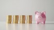© gen_pick - Pink piggy bank with coin stacks, symbolizing financial growth, savings, and investment