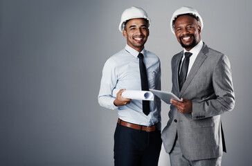 Aufkleber - Portrait, architect and men with tablet in studio of building safety, research and renovation schedule. People, talk and information report, blueprint and floor plan of maintenance on gray background