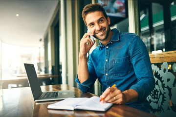 Poster - Man, phone call and writing in notebook at coffee shop with listening, smile and networking with remote work. Person, writer and smartphone with notes, planning and review for project at cafeteria