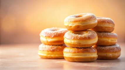 Poster - A stack of glazed donuts with powdered sugar dusted on top,  with a soft, warm background, ready to be devoured