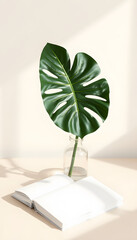 Wall Mural - White book mockup with a monstera leaf in a vase on a beige table isolated with white highlights, png