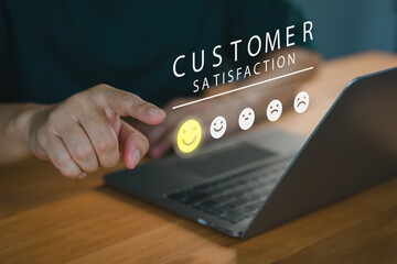 Fototapete - Customer select a happy face icon from a feedback scale with five emoji options, Concept of customer satisfaction, review, and positive user experience, decision-making in an online feedback system.