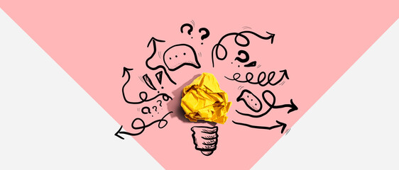 Poster - Brainstorming concept with a crumpled paper light bulb - Flat lay