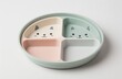 © KanitChurem - Cute divided plate for children's meals.