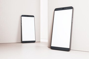 Poster - Two smartphones with blank white screens placed against beige walls and floor in a modern digital mockup concept. 3D Rendering