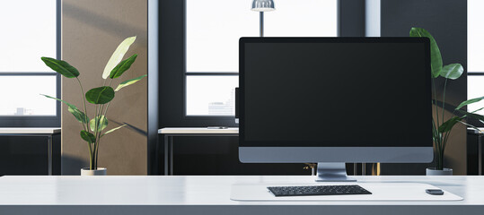 Poster - Modern office with a computer screen on a white desk near plants and windows in a bright interior. 3D Rendering