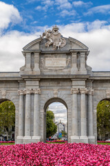 Madrid, Spain - october 10, 2024: Puerta de Alcala monument in Madrid once restored from the inclement weather in Madrid, Spain