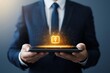 © Sweettymojidesign - Businessman holding tablet with glowing lock icon, representing digital security and technology innovation.