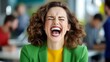© Nataliia_Trushchenko - Woman with a green jacket and yellow shirt is laughing and making a funny face. She is surrounded by other people, some of whom are looking at her. Scene is lighthearted and cheerful