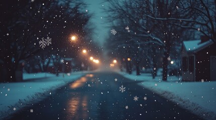 Poster - Snowflakes falling gently over an empty road lined with snow-covered trees in a quiet winter town
