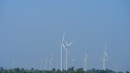 Wall Mural - wind turbine with blue sky background, sustainable energy concept	