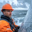 © gen_pick - Worker Inspecting Wind Turbine on Offshore Platform