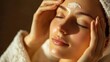 © Lifestyle Images - A woman is applying makeup to her face