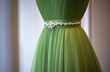 © RABBI - Elegant Green Dress with Pearl Belt Detail