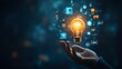 © MSH - Hand holding an illuminated light bulb with digital icons, Business idea light bulb with technology icon