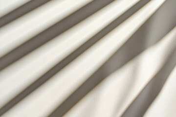 Poster - Soft shadows create calming effect on textured white fabric