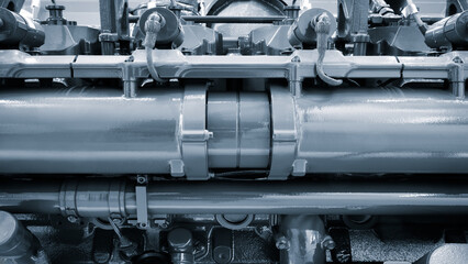 Aufkleber - Big gas engine diesel generator electric power with many wires pipes industrial machine concept background