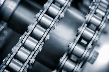 Poster - A chain made of metal with a silver color is shown in the image. The chain is made up of many links that are connected together. The links are all of the same size and shape