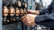 ©  Green Creator - Closeup of a team engineer adjusting control valves on an industrial machine, ensuring optimal performance