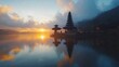 © Helois - A Hindu temple on an island in a lake at sunrise.