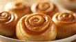 © Sonya - A plate of doughnuts is in sharp focus against a blurred background, showcasing their scrumptious details