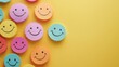 © GenZGraphics - Colorful paper smiley faces symbolizing positivity motivation and mental well being fostering good moods and optimism for a bright start to the day against a vibrant yellow backdrop