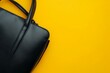 © Daria - Elegant black women s handbag and accessories on bright yellow background flat lay design