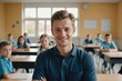 © ThomasLENNE - Close portrait of a smiling young Slovak male elegant primary school teacher standing and looking at the camera, indoors almost empty classroom blurred background