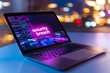 © Infinity Lens - A laptop with a 'security breach' warning flashing on the screen.