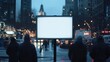 © afridwi1999 - A blank advertising billboard in a city street at dusk with pedestrians nearby.