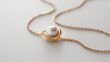 © anatoliycherkas - Elegant Minimal Gold Necklace With Pearl and Asymmetrical Design on Light Background for Fashion and Jewelry Styling