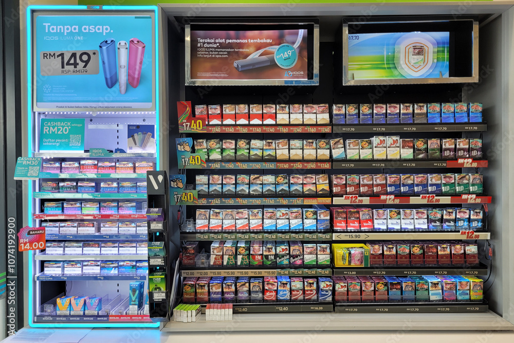 Penang, Malaysia - Oct 26, 2024: Tobacco product and vape display in a ...