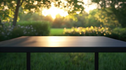 Poster - 3D rendering of a dark desk table with grassy forest space and a blurred sunset garden background ideal for food display or montage purposes