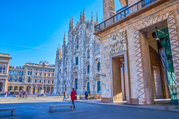 Wall Mural - Explore Piazza del Duomo with astonishing marble Duomo's facade, Milan, Italy