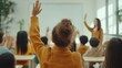 © mediavn - Education, question with group of children in classroom and raise their hands to answer. Learning or support, diversity and teacher teaching with young students in class of school building together